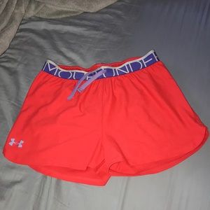 Under Armour red athletic shorts